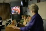 photo: U. of Minnesota meeting panelists with a view of national webcast