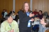 Working Group member Deborah Stehr talking with participants