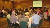 thumbnail photo: Fargo meeting participants listen to speaker