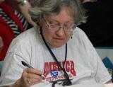 photo: Meeting Participant taking notes