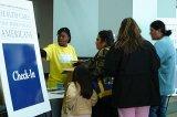 photo: Meeting Participants at check-in table