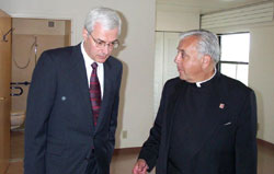 Photo of Msgr. Gugino (r.) and HUD Assistant Secretary Roy Bernardi at Syracuse, NY